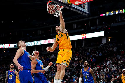 Jan 5, 2022; Denver, Colorado, USA; Utah Jazz forward Bojan Bogdanovic (44) scores a basket in the second quarter against the against the Denver Nuggets at Ball Arena. Mandatory Credit: Ron Chenoy-USA TODAY Sports