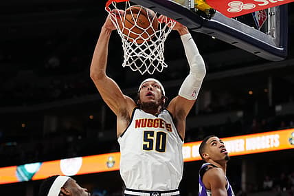 Jan 7, 2022; Denver, Colorado, USA; Denver Nuggets forward Aaron Gordon (50) dunks the ball in the first quarter against the Sacramento Kings at Ball Arena. Mandatory Credit: Ron Chenoy-USA TODAY Sports
