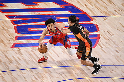 Jan 8, 2022; Detroit, Michigan, USA; Detroit Pistons guard Cade Cunningham (2) drives to the basket as Orlando Magic guard Cole Anthony (50) defends during the first quarter at Little Caesars Arena. Mandatory Credit: Tim Fuller-USA TODAY Sports