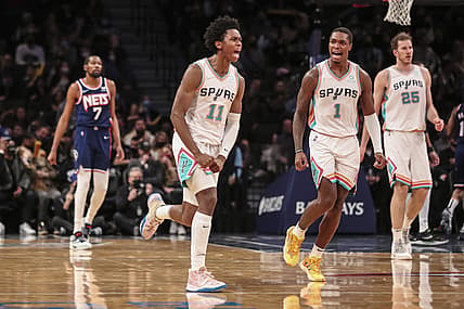 Jan 9, 2022; Brooklyn, New York, USA;  San Antonio Spurs guard Joshua Primo (11) celebrates with guard Lonnie Walker IV (1) after hitting a game tying basket in the fourth quarter after at Barclays Center. Mandatory Credit: Wendell Cruz-USA TODAY Sports