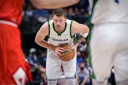 Jan 9, 2022; Dallas, Texas, USA; Dallas Mavericks guard Luka Doncic (77) looks to set the play against the Chicago Bulls during the second half at the American Airlines Center. Mandatory Credit: Jerome Miron-USA TODAY Sports