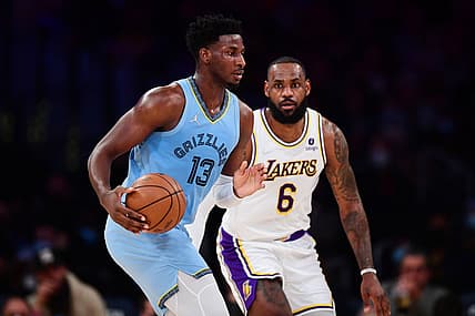 Jan 9, 2022; Los Angeles, California, USA; Memphis Grizzlies forward Jaren Jackson Jr. (13) controls the ball against Los Angeles Lakers forward LeBron James (6) during the first half at Crypto.com Arena. Mandatory Credit: Gary A. Vasquez-USA TODAY Sports