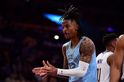 Jan 9, 2022; Los Angeles, California, USA; Memphis Grizzlies guard Ja Morant (12) reacts against the Los Angeles Lakers during the second half at Crypto.com Arena. Mandatory Credit: Gary A. Vasquez-USA TODAY Sports