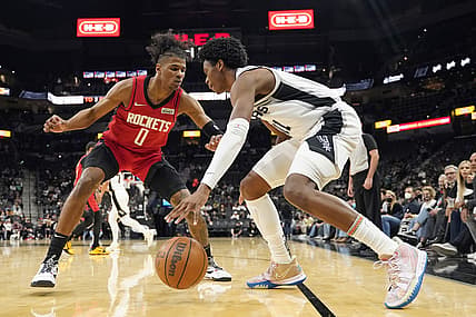 Jan 12, 2022; San Antonio, Texas, USA; San Antonio Spurs guard Joshua Primo (11) dribbles along the baseline while defended by Houston Rockets guard Jalen Green (0) during the first half at AT&T Center. Mandatory Credit: Scott Wachter-USA TODAY Sports