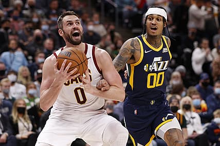 Jan 12, 2022; Salt Lake City, Utah, USA; Cleveland Cavaliers forward Kevin Love (0) looks to shoot against Utah Jazz guard Jordan Clarkson (00) in the second quarter at Vivint Arena. Mandatory Credit: Jeffrey Swinger-USA TODAY Sports