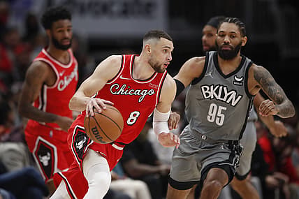 Jan 12, 2022; Chicago, Illinois, USA; Chicago Bulls guard Zach LaVine (8) dribbles the ball while defended by Brooklyn Nets guard DeAndre' Bembry (95) during the second half at United Center. Mandatory Credit: Kamil Krzaczynski-USA TODAY Sports