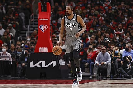 Jan 12, 2022; Chicago, Illinois, USA; Brooklyn Nets forward Kevin Durant (7) dribbles the ball up court against the Chicago Bulls during the second half at United Center. Mandatory Credit: Kamil Krzaczynski-USA TODAY Sports