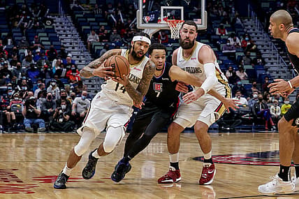 Jan 13, 2022; New Orleans, Louisiana, USA;   New Orleans Pelicans forward Brandon Ingram (14) dribbles against LA Clippers guard Amir Coffey (7) during the first half at the Smoothie King Center. Mandatory Credit: Stephen Lew-USA TODAY Sports