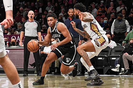 Jan 15, 2022; Brooklyn, New York, USA; Brooklyn Nets guard Cam Thomas (24) drives to the basket on  New Orleans Pelicans guard Nickeil Alexander-Walker (6) during the second quarter at Barclays Center. Mandatory Credit: Dennis Schneidler-USA TODAY Sports