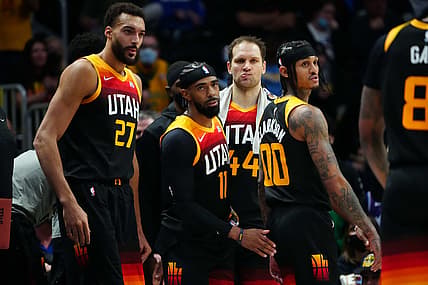 Jan 16, 2022; Denver, Colorado, USA; Utah Jazz center Rudy Gobert (27) and guard Mike Conley (11) and forward Bojan Bogdanovic (44) and guard Jordan Clarkson (00) during the fourth quarter against the Denver Nuggets  at Ball Arena. Mandatory Credit: Ron Chenoy-USA TODAY Sports