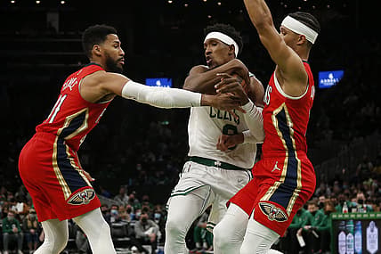 Jan 17, 2022; Boston, Massachusetts, USA; Boston Celtics guard Josh Richardson (8) tries to get between New Orleans Pelicans forward Garrett Temple (41) and guard Josh Hart (3) during the first half at TD Garden. Mandatory Credit: Winslow Townson-USA TODAY Sports