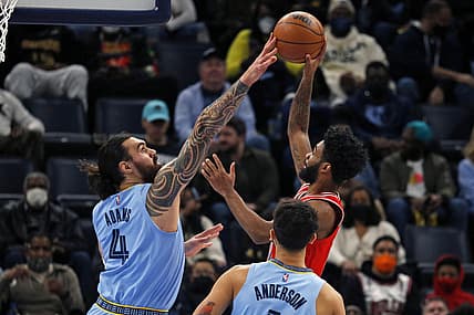 Jan 17, 2022; Memphis, Tennessee, USA; Memphis Grizzles center Steven Adams (4) blocks the shot of Chicago Bulls guard Coby White (right) during the first half at FedExForum. Mandatory Credit: Petre Thomas-USA TODAY Sports