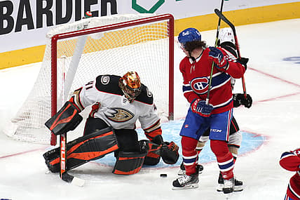 Jan 27, 2022; Montreal, Quebec, CAN; Anaheim Ducks goaltender Anthony Stolarz (41) makes a save against Montreal Canadiens left wing Michael Pezzetta (55) as defenseman Jamie Drysdale (34) defends during the first period at Bell Centre. Mandatory Credit: Jean-Yves Ahern-USA TODAY Sports