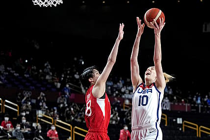 Aug 8, 2021; Saitama, Japan; United States forward Breanna Stewart (10) shoots the ball against Japan centre Maki Takada (8) in the women's basketball gold medal match during the Tokyo 2020 Olympic Summer Games at Saitama Super Arena. Mandatory Credit: James Lang-USA TODAY Sports
