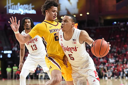 Feb 9, 2022; Lincoln, Nebraska, USA;  Nebraska Cornhuskers guard Bryce McGowens (5) moves against Minnesota Golden Gophers guard Sean Sutherlin (24) in the first half at Pinnacle Bank Arena. Mandatory Credit: Steven Branscombe-USA TODAY Sports