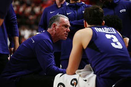 Feb 12, 2022; Lubbock, Texas, USA;  Texas Christian Horned Frogs head coach Jamie Dixon during the first half talks with his team during a time out in the game against the Texas Tech Red Raiders at United Supermarkets Arena. Mandatory Credit: Michael C. Johnson-USA TODAY Sports