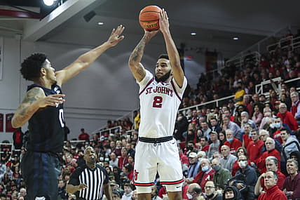 Feb 18, 2022; Queens, New York, USA; St. John's Red Storm guard Julian Champagnie (2) attempts a three-point shot in the second half against the Butler Bulldogs at Carnesecca Arena. Mandatory Credit: Wendell Cruz-USA TODAY Sports