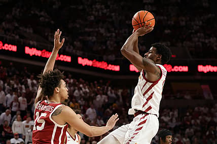 Feb 19, 2022; Ames, Iowa, USA; Oklahoma Sooners forward Ethan Chargois (15) defends Iowa State Cyclones guard Izaiah Brockington (1)] at James H. Hilton Coliseum. The Cyclones win 75 to 54. Mandatory Credit: Reese Strickland-USA TODAY Sports