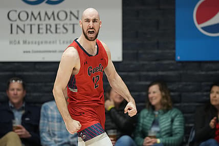 Feb 19, 2022; Moraga, California, USA; Saint Mary's Gaels guard Tommy Kuhse (12) reacts after scoring a basket while being fouled against the Brigham Young Cougars during the first half at University Credit Union Pavilion. Mandatory Credit: Darren Yamashita-USA TODAY Sports