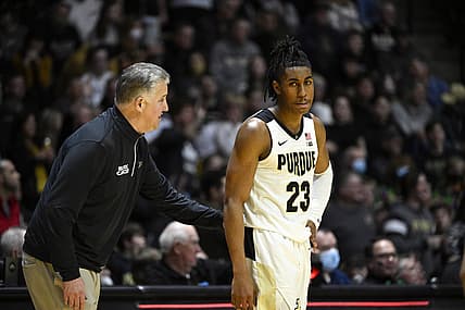 Feb 20, 2022; West Lafayette, Indiana, USA; Purdue Boilermakers guard Jaden Ivey (23) gets a word from Purdue Boilermakers head coach Matt Painter during the second half against the Rutgers Scarlet Knights at Mackey Arena. Mandatory Credit: Marc Lebryk-USA TODAY Sports