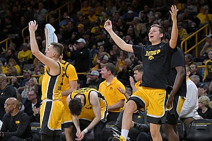 Feb 22, 2022; Iowa City, Iowa, USA; Iowa Hawkeyes guard Austin Ash (right) and guard Jordan Bohannon (3) react during the second half against the Michigan State Spartans at Carver-Hawkeye Arena. Mandatory Credit: Jeffrey Becker-USA TODAY Sports