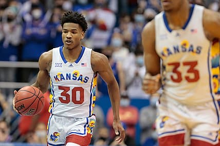 Kansas senior guard Ochai Agbaji (30) dribbles down court during the first half of Tuesday's Sunflower Showdown game against Kansas State inside Allen Fieldhouse.