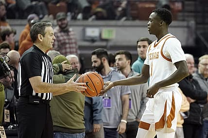 Feb 23, 2022; Austin, Texas, USA; Texas Longhorns guard Andrew Jones (1) hands the ball to an official before the game against the Texas Christian Horned Frogs at Frank C. Erwin Jr. Center. Mandatory Credit: Scott Wachter-USA TODAY Sports