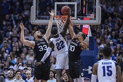 Feb 23, 2022; Newark, New Jersey, USA; Seton Hall Pirates guard Myles Cale (22) drives to the basket as Butler Bulldogs forward Bryce Nze (10) and forward Bryce Golden (33) defend during the first half at Prudential Center. Mandatory Credit: Vincent Carchietta-USA TODAY Sports