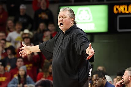 Feb 23, 2022; Ames, Iowa, USA; West Virginia Mountaineers head coach Bob Huggins talks to officials during their game with the Iowa State Cyclones at James H. Hilton Coliseum. Iowa State wins 84 to 81.   Mandatory Credit: Reese Strickland-USA TODAY Sports
