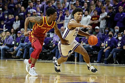 Feb 26, 2022; Manhattan, Kansas, USA;  Kansas State Wildcats guard Mark Smith (13) dribbles by Iowa State Cyclones guard Izaiah Brockington (1) during the first half at Bramlage Coliseum. Mandatory Credit: Scott Sewell-USA TODAY Sports