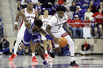 Feb 26, 2022; Fort Worth, Texas, USA; Texas Tech Red Raiders guard Davion Warren (2) steals the ball from TCU Horned Frogs guard Mike Miles (1) in the second half at Ed and Rae Schollmaier Arena. Mandatory Credit: Tim Heitman-USA TODAY Sports