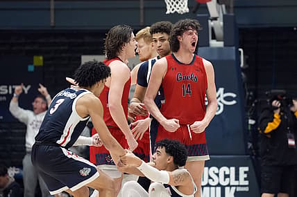 Feb 26, 2022; Moraga, California, USA; Saint Mary's Gaels forward Kyle Bowen (14) reacts after drawing a charging foul from Gonzaga Bulldogs guard Julian Strawther (0) during the second half at University Credit Union Pavilion. Mandatory Credit: Darren Yamashita-USA TODAY Sports