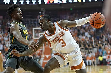 Feb 28, 2022; Austin, Texas, USA; Texas Longhorns guard Courtney Ramey (3) drives to the basket while defended by Baylor Bears guard Adam Flagler (10) during the first half at Frank C. Erwin Jr. Center. Mandatory Credit: Scott Wachter-USA TODAY Sports