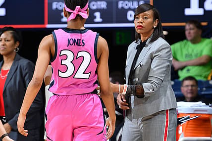Mar 3, 2019; South Bend, IN, USA; Virginia Cavaliers head coach Tina Thompson talks to forward Mone Jones (32) in the first half against the Notre Dame Fighting Irish at the Purcell Pavilion. Mandatory Credit: Matt Cashore-USA TODAY Sports