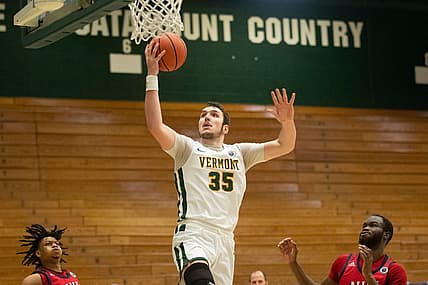 Vermont   s Ryan Davis (35) leaps for a layup during the men   s basketball game between the NJIT vs. Vermont at Patrick Gym on Sunday afternoon December 27, 2020 in Burlington, Vermont.

Njit Vs Vermont Men S Basketball 12 27 20