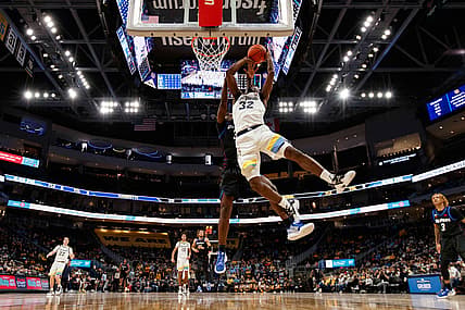 Jan 11, 2022; Milwaukee, Wisconsin, USA;  Marquette Golden Eagles guard Darryl Morsell (32) shoots during the first half against the DePaul Blue Demons at Fiserv Forum. Mandatory Credit: Jeff Hanisch-USA TODAY Sports