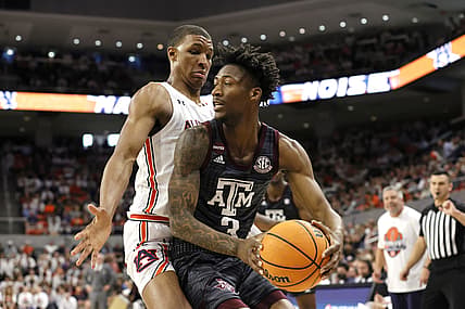 Feb 12, 2022; Auburn, Alabama, USA; Auburn Tigers forward Jabari Smith (10) blocks Texas A&M Aggies guard Quenton Jackson (3) during the first half at Auburn Arena. Mandatory Credit: John Reed-USA TODAY Sports