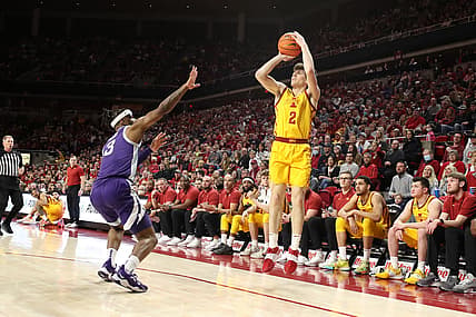 Feb 12, 2022; Ames, Iowa, USA; Iowa State Cyclones guard Caleb Grill (2) shoots over the top of Kansas State Wildcats guard Selton Miguel (3) at James H. Hilton Coliseum. The Wildcats win 75 to 69.  Mandatory Credit: Reese Strickland-USA TODAY Sports