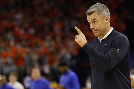 Feb 23, 2022; Charlottesville, Virginia, USA; Virginia Cavaliers head coach Tony Bennett acknowledges one of his players from the bench against the Duke Blue Devils in the second half at John Paul Jones Arena. Mandatory Credit: Geoff Burke-USA TODAY Sports