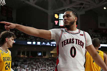 Feb 16, 2022; Lubbock, Texas, USA;  Texas Tech Red Raiders guard Kevin Obanor (0) signals during the game against the Baylor Bears in the second half at United Supermarkets Arena. Mandatory Credit: Michael C. Johnson-USA TODAY Sports