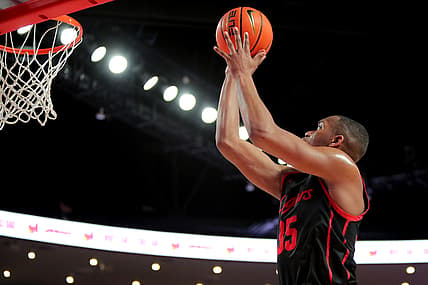 Feb 27, 2022; Houston, Texas, USA; Houston Cougars forward Fabian White Jr. (35) scores a layup against the Southern Methodist Mustangs during the second half at Fertitta Center. Mandatory Credit: Erik Williams-USA TODAY Sports