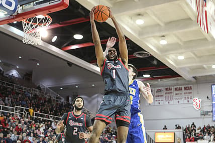 Mar 2, 2022; Queens, New York, USA; St. John's Red Storm forward Aaron Wheeler (1) grabs a rebound in the first half against the Xavier Musketeers at Carnesecca Arena. Mandatory Credit: Wendell Cruz-USA TODAY Sports