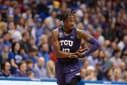 TCU junior guard Damion Baugh (10) celebrates a three-pointer in the second half of Thursday's game against Kansas inside Allen Fieldhouse.