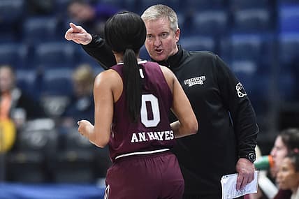 Mississippi State interim basketball coach Doug Novak talks with guard Anastasia Hayes (0) during the SEC Women's Basketball Tournament game against Kentucky in Nashville, Tenn. on Thursday, March 3, 2022.

Miss St Ky Sec