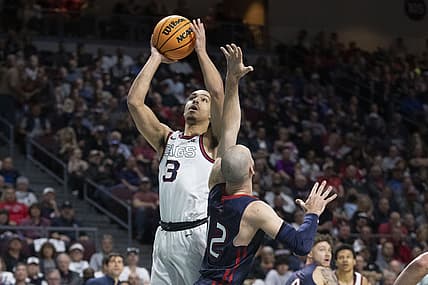 March 8, 2022; Las Vegas, NV, USA; Gonzaga Bulldogs guard Andrew Nembhard (3) shoots the basketball against Saint Mary's Gaels guard Tommy Kuhse (12) during the first half in the finals of the WCC Basketball Championships at Orleans Arena. Mandatory Credit: Kyle Terada-USA TODAY Sports