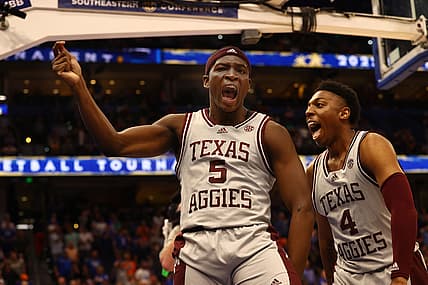 Mar 10, 2022; Tampa, FL, USA; Texas A&M Aggies guard Hassan Diarra (5) celebrates with Texas A&M Aggies guard Wade Taylor IV (4) as Diarra hit the game winning three point basket at Amalie Arena. Mandatory Credit: Kim Klement-USA TODAY Sports