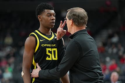 Mar 10, 2022; Las Vegas, NV, USA; Oregon Ducks head coach Dana Altman talks to forward Eric Williams Jr. (50) in a game against the Colorado Buffaloes during the second half at T-Mobile Arena. Mandatory Credit: Stephen R. Sylvanie-USA TODAY Sports