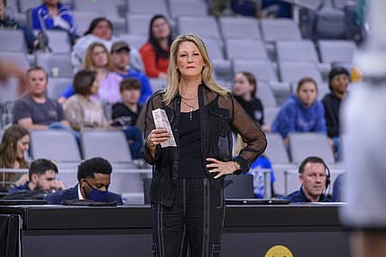 Mar 10, 2022; Fort Worth, TX, USA; UCF Knights head coach Katie Abrahamson-Henderson watches her team take on the South Florida Bulls during the first half of the American Conference Tournament Championship at Dickies Arena. Mandatory Credit: Jerome Miron-USA TODAY Sports