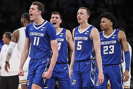 Mar 11, 2022; New York, NY, USA;  Creighton Bluejays center Ryan Kalkbrenner (11) and forward Ryan Hawkins (44) and guards Alex O'Connell (5) and Trey Alexander (23) celebrate after a timeout by the Providence Friars in the second half at the Big East Tournament at Madison Square Garden. Mandatory Credit: Wendell Cruz-USA TODAY Sports
