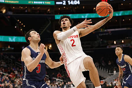 Mar 12, 2022; Washington, D.C., USA; Dayton Flyers forward Toumani Camara (2) shoots the ball a s Richmond Spiders forward Tyler Burton (3) defends in the second half at Capital One Arena. Mandatory Credit: Geoff Burke-USA TODAY Sports